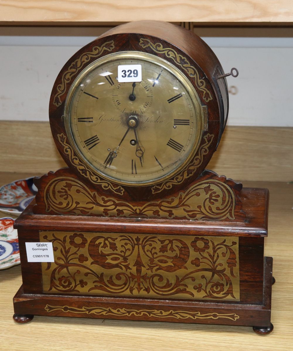Ganthony of London. A brass inlaid rosewood mantel timepiece, height 44cm